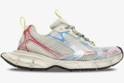 Side profile of Balenciaga 3XL Sneaker in distressed multi-color mesh with chunky sole. - SKU 734734W3XL59645