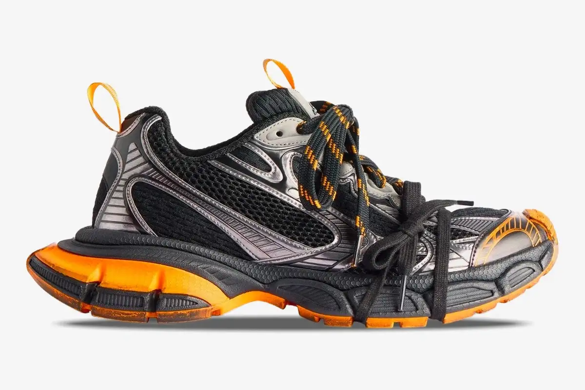 balenciaga-3xl-orange-grey-mesh-side-view-734734w3xl31178-757-874 Side profile of Balenciaga 3XL mesh and polyurethane low top sneakers in orange, grey, and black. - SKU 734734W3XL31178