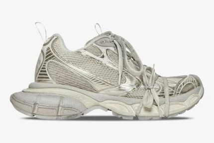Side profile of Balenciaga 3XL reflective distressed mesh sneakers in beige with chunky soles. - SKU 734734W3XL49191