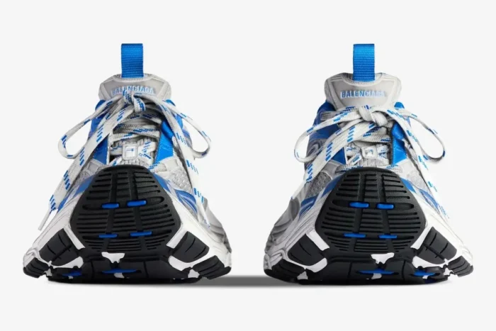 Front view of Balenciaga 6XL sneakers in grey, blue, and white with chunky outsoles. - SKU 815859W2MV21490