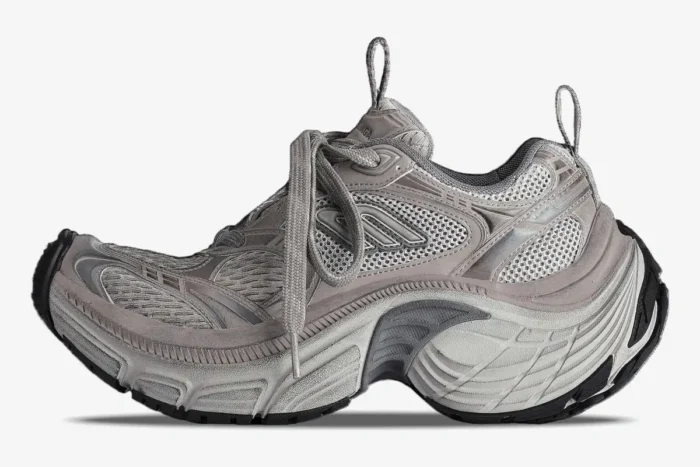 Side profile of the Balenciaga 6XL Sneaker in grey, featuring an oversized, chunky curved sole. - SKU 815853W2MV22211