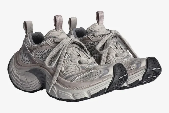 Grey Balenciaga 6XL oversized sneakers in a three-quarter side view with chunky soles and mesh panels. - SKU 815853W2MV22211