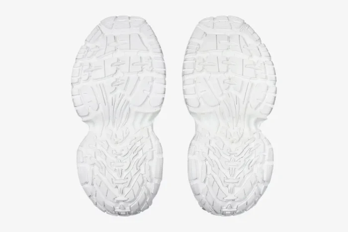 Bottom view of white Balenciaga 6XL Sneaker Oversized Edition showing the chunky treaded soles. - SKU 815853W2MV29000