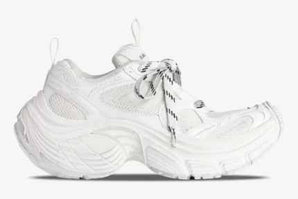 Side profile of the Balenciaga 6XL Sneaker White Oversized Edition with a chunky sole and mesh panels. - SKU 815853W2MV29000