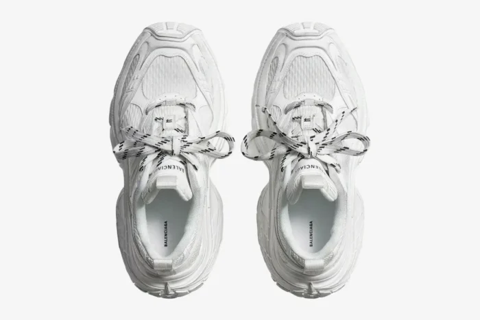 Top-down view of white Balenciaga 6XL sneakers with patterned laces on a white background. - SKU 815853W2MV29000