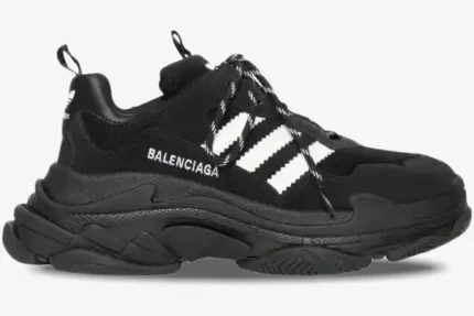 Side profile of Balenciaga x Adidas Triple S sneakers in black and white with chunky soles. - SKU 712821W2ZB21090