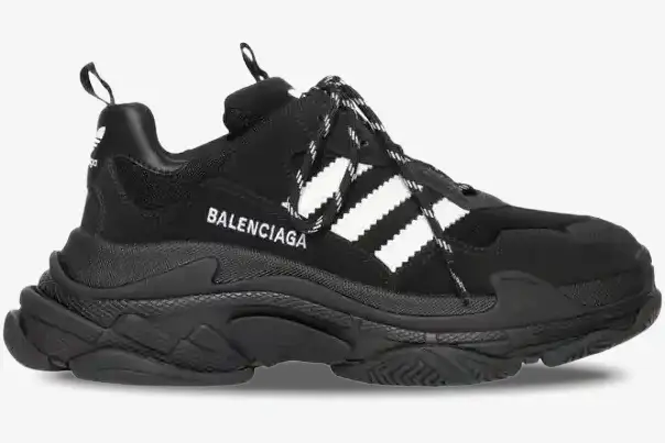 balenciaga-adidas-triple-s-black-white-side-712821w2zb21090-261-533 Side profile of Balenciaga x Adidas Triple S sneakers in black and white with chunky soles. - SKU 712821W2ZB21090