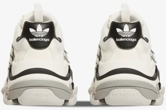 Rear view of white and black Balenciaga x Adidas Triple S collaboration sneakers with chunky soles. - SKU 710021W2ZB19112