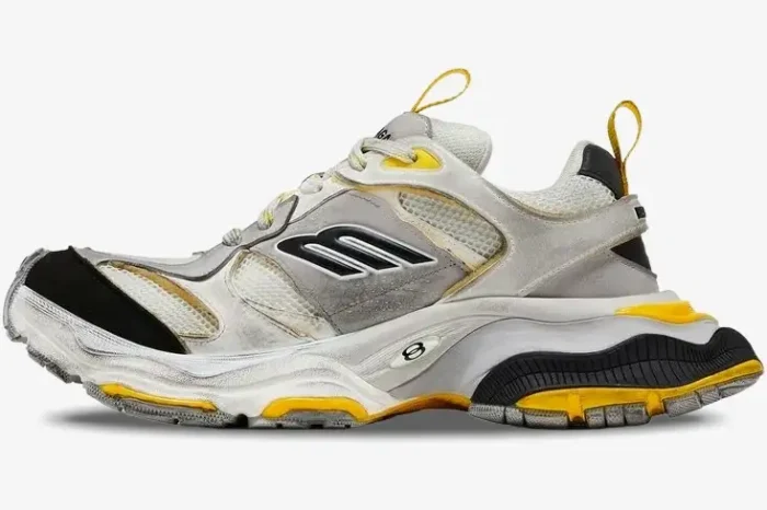 Balenciaga Cargo Sneaker in worn-out grey, yellow, and black, shown from a side profile view. - SKU 784341W2MV11170
