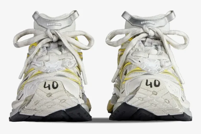 Front view of Balenciaga Runner 2 Distressed Mesh sneakers in yellow and silver with size 40 on the toe. - SKU 779066W3RXP9710