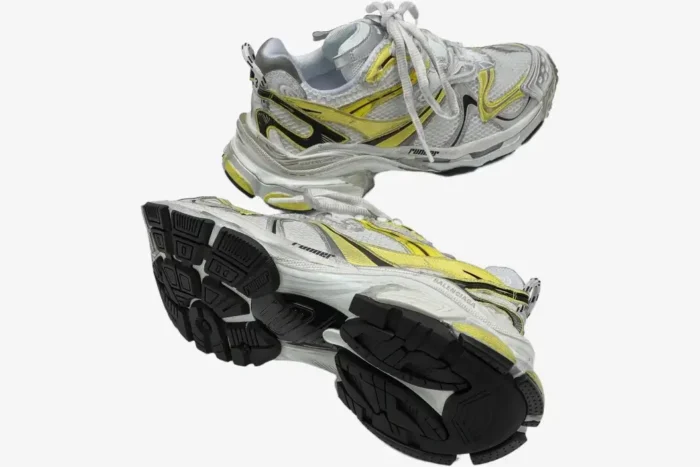 Balenciaga Runner 2 distressed mesh sneakers in yellow and silver, showing side profile and bottom sole views. - SKU 779066W3RXP9710