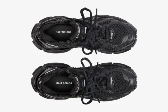 Top-down view of Balenciaga Runner All Black Distressed Sneakers showing black mesh and logo details. - SKU 772774W3RBT1000
