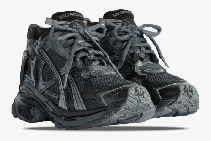 Balenciaga Runner Sneaker in distressed grey and silver, three-quarter front view. - SKU 677403W3RB11000