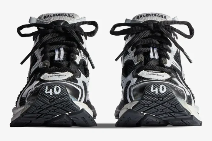 Front view of Balenciaga Runner Sneaker Distressed Edition in black and white with size 40 on the toe. - SKU 772774W3RMU9010