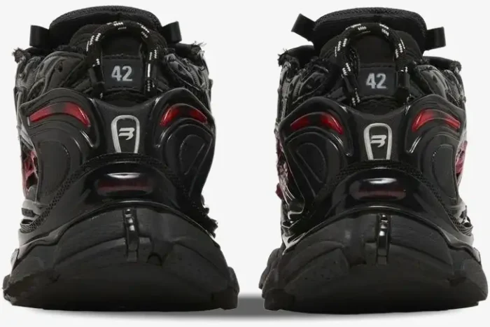 Back view of Balenciaga Runner Graffiti sneakers in black and red with distressed details and size 42 label. - SKU 677403W3RBQ1060