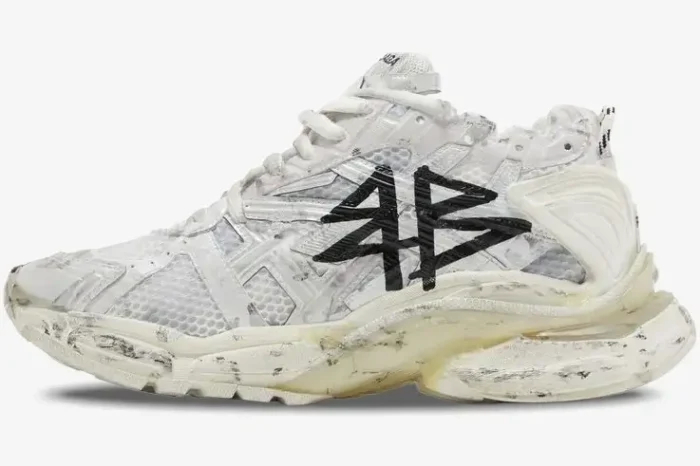 Balenciaga Runner Graffiti sneaker in white and black, side profile view with distressed finish. - SKU 677403W3RBQ9010