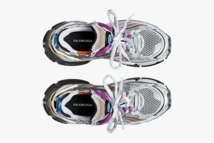 Top-down view of Balenciaga Runner sneakers in distressed silver, white, and multicolor accents. - SKU 772774W3RMU8123