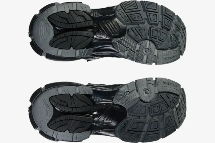 Bottom view of Balenciaga Runner Sneaker BL206 in distressed grey and silver, showing the intricate outsole pattern. - SKU 677403W3RB11000