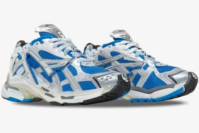 Balenciaga Runner sneakers in blue, white, and grey, shown from a side three-quarter angle. - SKU 677403W3RB34912