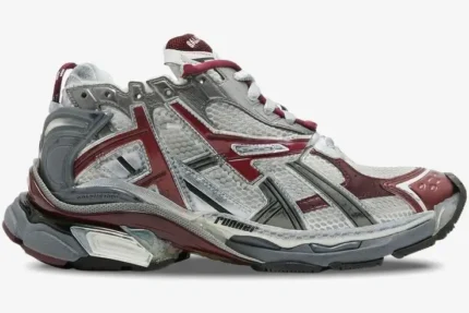 Side profile of Balenciaga Runner Sneaker in burgundy and silver with a distressed finish. - SKU 677403W3RB39069