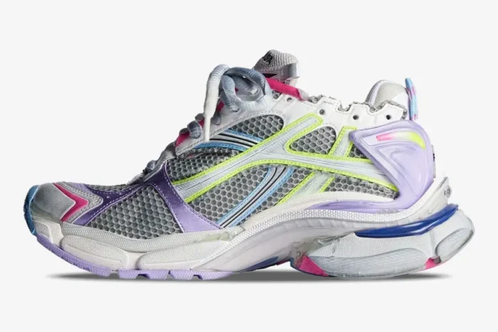 Side profile of a Balenciaga Runner Sneaker in distressed multi-color mesh and leather. - SKU 772767W3RMU1745