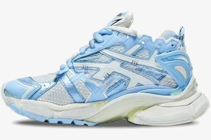 Side profile of a Balenciaga Runner Sneaker in light blue and white with a chunky sole. - SKU 677402W3RB29744