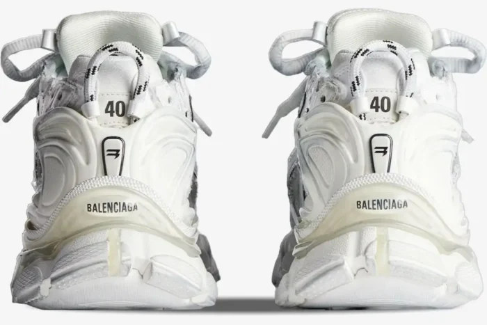 Rear view of Balenciaga Runner Sneakers in white, showing the heel logo and size 40 detail. - SKU 772774W3RMU9000