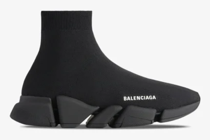 Side profile of a Balenciaga Speed 2.0 Recycled Knit Sneaker in black with a segmented sole. - SKU 617239W2DB11013