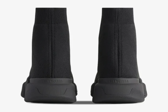 Rear view of Balenciaga Speed 2.0 Recycled Knit Sneakers in black with embossed logo on heels. - SKU 617239W2DB11013