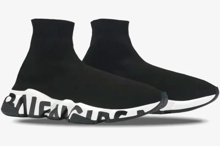 Side view of Balenciaga Speed Graffiti Trainers in black with white logo midsoles. - SKU 605972W05GE1015