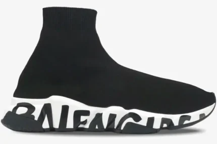 Side view of a black Balenciaga Speed Graffiti Trainer with a white chunky logo sole. - SKU 605972W05GE1015
