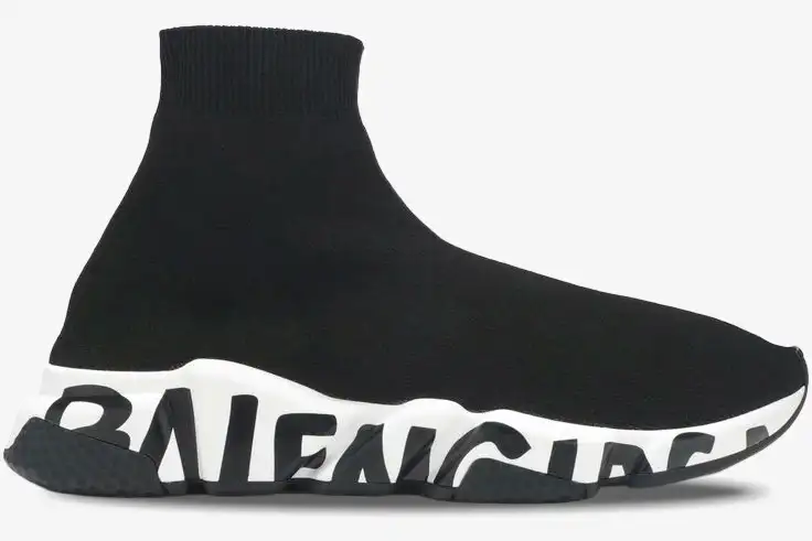 balenciaga-speed-graffiti-trainer-side-view-605972w05ge1015-223-218 Side view of a black Balenciaga Speed Graffiti Trainer with a white chunky logo sole. - SKU 605972W05GE1015