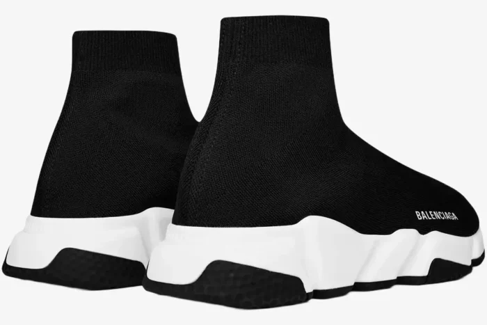 Rear view of Balenciaga Speed Trainer black and white sneakers with chunky soles and knit uppers. - SKU 483502W05G01000