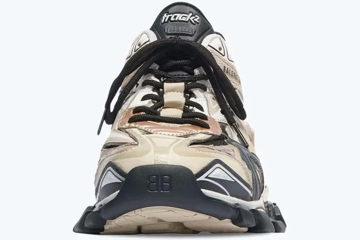 Front view of Balenciaga Track 2.0 sneakers in beige, black, and silver with layered mesh and nylon. - SKU 568614W2GN39170