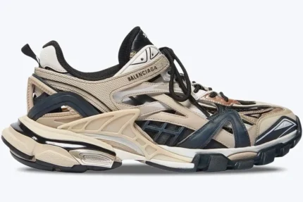 Side profile of Balenciaga Track 2.0 sneakers in beige, black, and silver. - SKU 568614W2GN39170