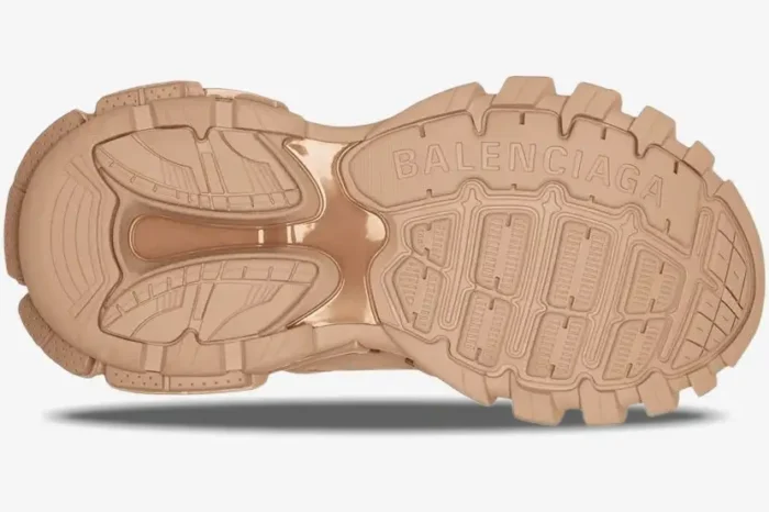 Bottom view of the beige Balenciaga Track sneaker's rugged multi-layered rubber outsole. - SKU 542023W2LA19870