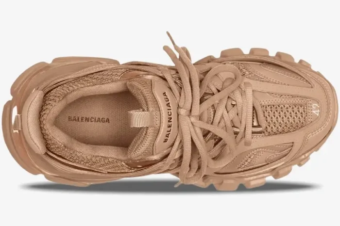 Top-down view of Balenciaga Track beige multi-layered sneakers showing laces and interior branding. - SKU 542023W2LA19870