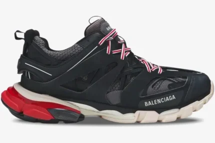 Balenciaga Track sneaker in black, grey, and red, shown in a side profile view. - SKU 542023W1GB61002