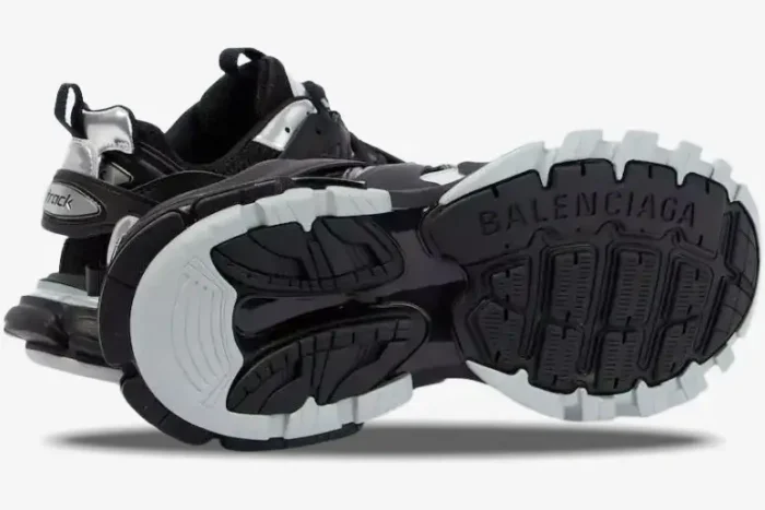 Bottom view of Balenciaga Track sneakers in black and silver showing the chunky rubber sole. - SKU 542023 W2FSC1081