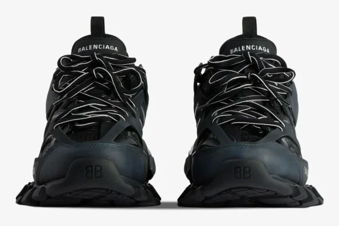 Front view of black Balenciaga Track mesh and nylon sneakers with white-accented laces. - SKU 542023W1GB11000