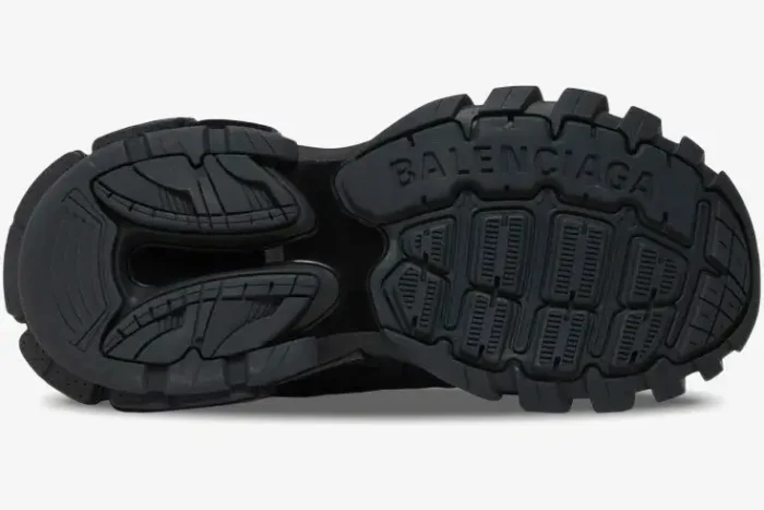 Bottom view of the black Balenciaga Track Led sneaker showing the textured outsole and logo. - SKU 555036W2GB11000