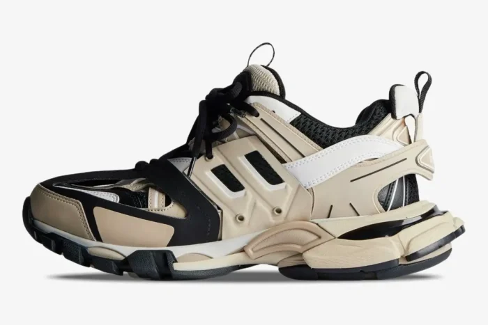Balenciaga Track Sneaker in beige, black, and white shown from a side profile view. - SKU 542023W3AC48071