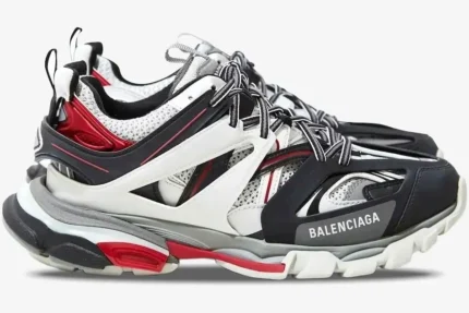 Side profile of Balenciaga Track sneakers in black, red, white, and silver with a chunky layered sole. - SKU 542023W1GB81285