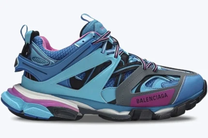Side profile of a Balenciaga Track Trainer sneaker in light blue, pink, and grey colorway. - SKU 542023W1GB54162