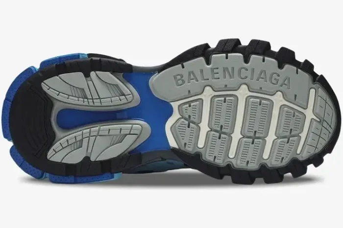 Bottom sole view of Balenciaga Track Trainer in light blue and grey with chunky tread. - SKU 542023W1GB54162