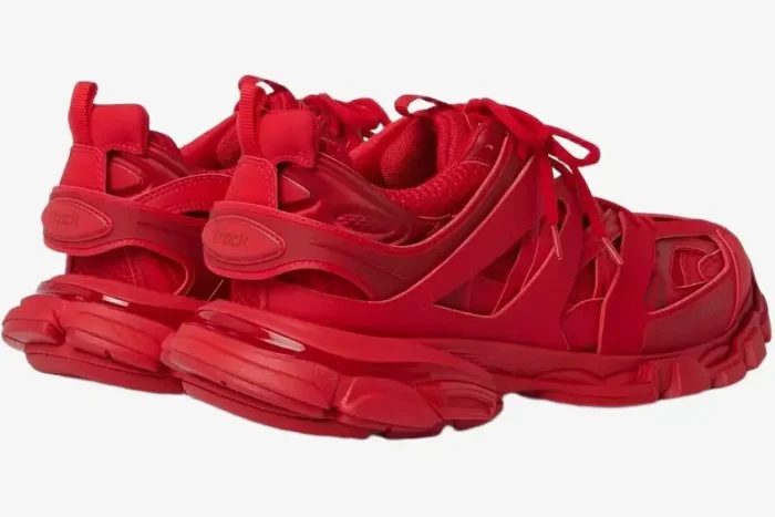 Red monochromatic Balenciaga Track Trainers shown from a rear three-quarter angle on a white background. - SKU 542023W2LA16000