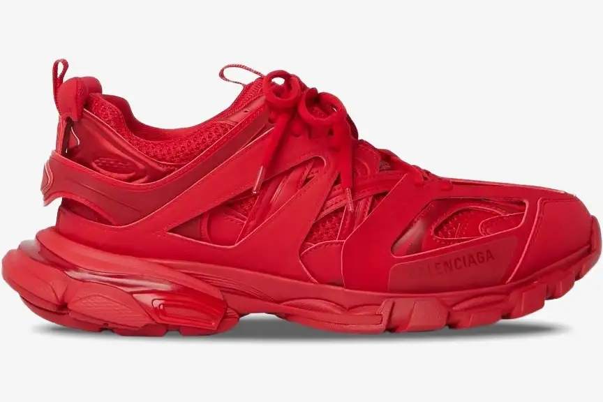 balenciaga-track-trainer-red-side-profile-542023w2la16000-328-319 Side profile of a monochromatic red Balenciaga Track Trainer with layered mesh and nylon panels. - SKU 542023W2LA16000