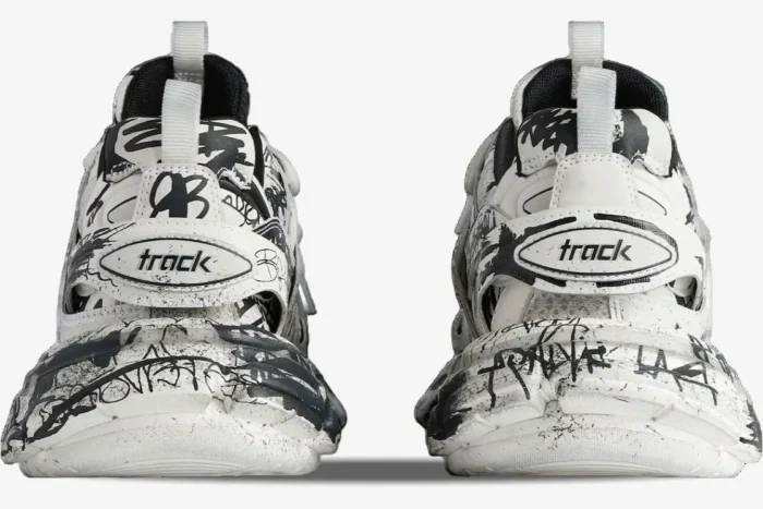 Rear view of Balenciaga Track sneakers in white and black graffiti print. - SKU 542023W3RRA9010
