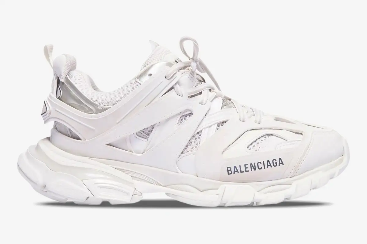 balenciaga-track-white-sneakers-side-view-542023w1gb19000-454-387 Side profile of Balenciaga Track white multi-layered sneakers with chunky soles and logo detail. - SKU 542023W1GB19000