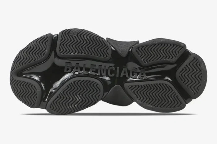 Bottom view of Balenciaga Triple S black clear sole sneakers showing the tread and logo - SKU 541624W2FB11000